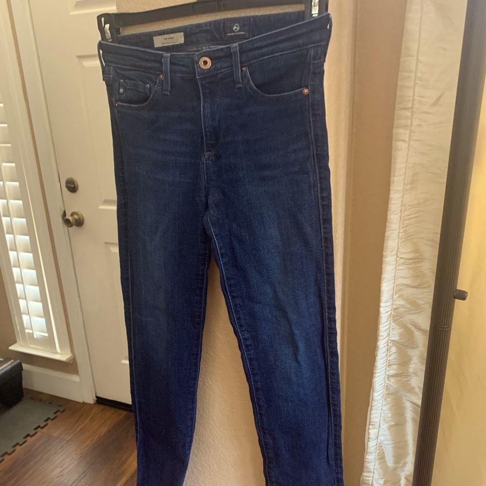 AG jeans. Mid rise cigarette style. Size 25R
